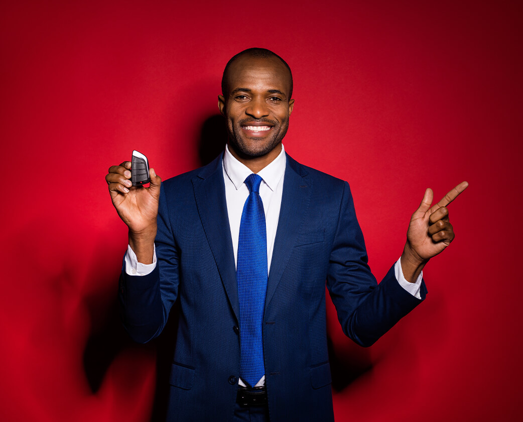 man with key in hand